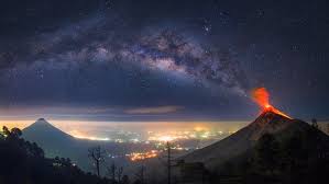 The minor arms are primarily filled with gas and this arm is shorter than the two major arms and lies along the bar of the galaxy. 7680x4320 Erupting Volcano With Milky Way As A Back Drop 8k Wallpaper Hd Nature 4k Wallpapers Images Photos And Background Wallpapers Den