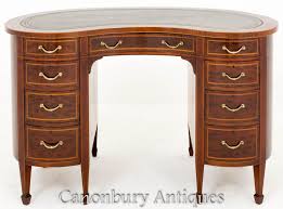 That's why we have a wide range of tables in different shapes, colors and materials, to make sure. Victorian Plum Pudding Mahogany Kidney Desk Writing Table