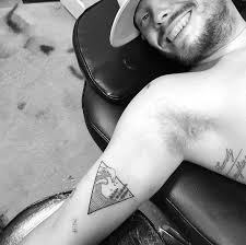 Biceps muscles provide an ideal spot for tattoo placement not only because they naturally accentuate a man's masculinity but. 50 Inner Outer Bicep Tattoos For Men 2021 Tribal Designs