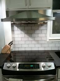 Frosted Glass White Subway Tile Backsplash From The Tile Shop Custom Building Products Kitchen Remodel Under Cabinet Range Hoods White Subway Tile Backsplash