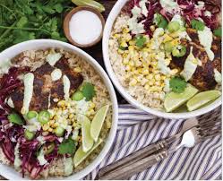 Squeeze the juice from one lime half into the fish taco sauce mixture, then whisk. Fish Taco Bowls With Charred Corn Cilantro Lime Sour Cream East Side Table