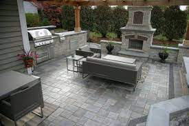 Stone stone heute bestellen, versandkostenfrei. Patio With Fireplace And Grill Island By Unilock With Richcliff Paver Photos Backyard Fireplace Patio With Fireplace Backyard Fireplace Patio