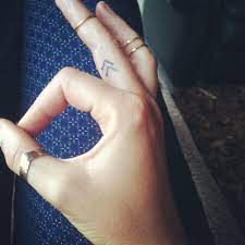 20 Tiny Tattoos With Big Meanings Inner Finger Tattoo Small Finger Tattoos Cute Small Tattoos