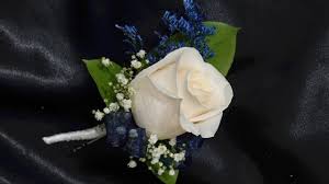 Here fake flowers marks the point. How To Make A Single Rose Boutonniere Youtube