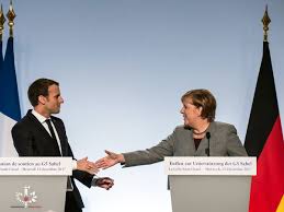 A short video shows merkel approaching seehofer and extending her hand. Merkel Flies Home Early From Paris Summit As Germany Holds Secret Talks To Build New Grand Coalition The Independent The Independent