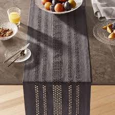 Jemme 120 Charcoal Grey Table Runner A Modern Take On Classic Eyelet Table Linens Our Dark Grey Jemme Table Runner Table Runners Grey Table Crate And Barrel