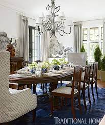 Wayfair carries models designed to fit with such decorative schemes as traditional, rustic, coastal, french country, glam, and more. Classically Inspired Dinner Party In Blue And White Dining Room Design Dining Room Decor Traditional Elegant Dining Room