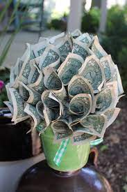 This Diy Money Arrangement Is Simple To Make Using A Cute Pot A Styrofoam Ball And Floral Picks Great Gift Idea Fo Money Flowers Money Bouquet Birthday Money