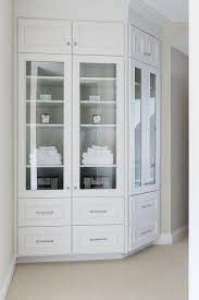 With a variety of colors and styles, you are sure to complement your bathroom decor. Glass Front Linen Cabinets On Curved Wall Transitional Bathroom