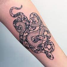 Hand drawn snake against floral pattern background. Floral Snake Tattoo Badass Tattoos Tattoos Snake Tattoo Design
