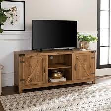 Tangkula farmhouse tv stand with sliding barn door, wood universal tv console for tv's up to 55 flat screen for living room, storage cabinet with 2 gliding doors & adjustable shelves (deep taupe) $169.99. Barnwood Barn Doors Tv Stand Kirklands