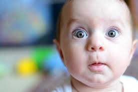 The boy of indeterminate eye color