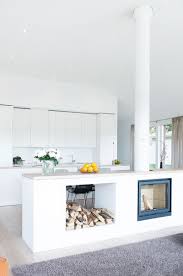 25 Cool Firewood Storage Designs For Modern Homes Open Plan Kitchen Living Room Kitchen Fireplace Kitchen Interior