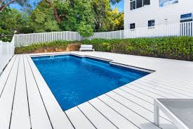 A tiny deck that will fit for small backyard. Landscaping Ideas To Take Your Above Ground Pool To The Next Level