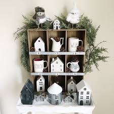 Farmhouse Shelf Styled For Winter With White Ceramic Houses Galvanized Metal Houses And White Decor Christmas Decorations Ceramic Houses Farmhouse Shelves