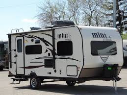 It consists of a slide out of 18 inches, which can effortlessly fit in a sofa. 6 Best Small Travel Trailers With Slide Out Floor Plans What Else Can Fascinate Mor Small Travel Trailers Lightweight Travel Trailers Rockwood Travel Trailers