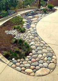 Have You Considered Revamping Your Entrance Yard But Don T Need To Break The Ba Rock Garden Landscaping Backyard Garden Landscape Front Yard Landscaping Design