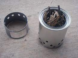 Holes punched in the two cans create a chamber of heated air and a second phase of combustion, resulting in a more efficient flame. Diy Wood Gas Stove Instructions The Ultimate Hang