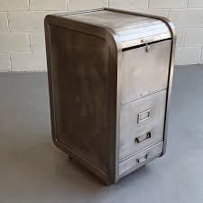 Choose fingerprint or electronic locks for highly valuable items, or opt for combination or cam locks for more traditional options. Brushed Steel Roll Top File Cabinet By Steel Master At 1stdibs