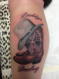 Lucky 7 Tattoo And Piercing Cowboy Tattoos Daddy Tattoos Cowboy Hat Tattoo