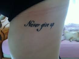 Never Give Up Rib Tattoo Rib Tattoo Tattoos Tattoo Quotes