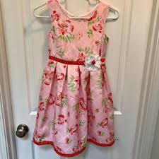 Add water daily to ensure your floral arrangement stays fresh and display the flowers in a cool location away from direct. Jona Michelle Light Pink Floral Dress With White Flower At Waist Red And White Polka Dot Ribbon At Hem And Front Waistband Ribbon Sash Tie In Back 4 Pink Button Closure Knee