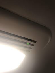 Combination light, heater and exhaust fan fixtures are practical in smaller bathrooms and powder rooms that don't have heating vents. What Is This Tiny Green Light In My Bathroom Ceiling Vent Whatisthisthing