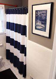 Almost Didn T Notice The Terrible Tile Of The 50s Blue Bathroom Decor Navy Blue Bathroom Decor Nautical Shower Curtains