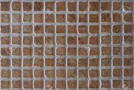 Small format tiles can easily create a busy space because of the quantity being laid. Small Square Ceramic Tiles In Different Shades Of Brown With Stock Photo Picture And Royalty Free Image Image 120348665