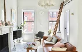 A 600 Square Foot Nyc Apartment Is Filled With Natural Light Small Space Ideas And Clever Book Displays In 2020 Dining Room Contemporary White Wooden Floor Furniture Design Modern