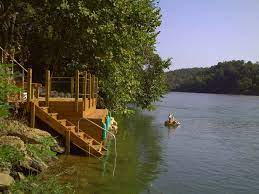A futon that sleeps 2 is located in the living area. Doniphan Mo The Memory Cabin In Doniphan Mo River Front Vacation Rental Current River River Cabin River Vacation River Retreat