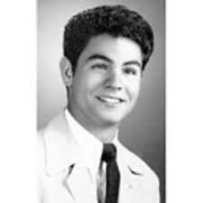 My friend Lizzie, left and I In front of our apt. building at 920 Ave. St.  John and the corner of Kelly Street. The year was 1961. J. H. S. 52, all