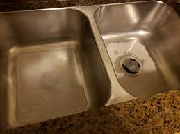 clog in double kitchen sink after too