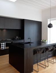 Who says kitchens need to be boring, white, and monotonous? A Matte Black Kitchen Makes A Bold Statement In This Auckland Villa Modern Black Kitchen Matte Black Kitchen Black Kitchen Design