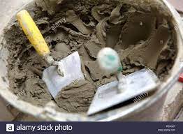 Check spelling or type a new query. A Plastic Construction Bucket With Cement Based Glue Ready To Be Used For Gluing Ceramic Tiles Stock Photo Alamy
