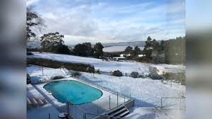Snow is a type of precipitation in the form of crystalline water ice, consisting of a multitude of snowflakes that fall from clouds. Tasmania Snow A Rare Winter Wonderland Blanketed Australia Cnn