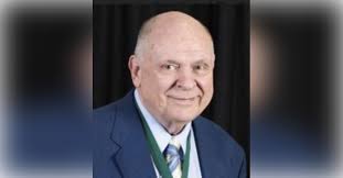 Obituary information for Dr. Albert J. Carnine