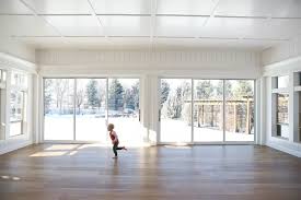 Sunroom and solarium shading systems utilize tracks to carry them up and down. How To Convert A Back Patio Into Interior Living Space
