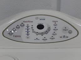 The nylon cord is located and pulled in a direction away from the lock area. Maytag Neptune Washer Dryer Set United Country Musick Sons