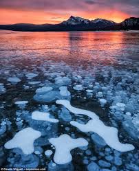Now that shadow moth knows that alya is rena rouge, he will use his sentimonster to trap all the people she loves the most in bubbles in the paris sky. What Bubbles Beneath Beautiful Patterns Of Frozen Bubbles Trapped In Canada Lake Are Highly Flammable Methane Gas Daily Mail Online