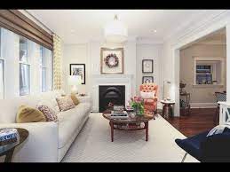 To the living area this could be the couch or the entertainment center. This Designer S Living Room Is A Masterclass In Mixing Decor Styles Youtube