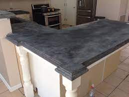 A sealer that penetrates the surface of the concrete and is absorbed into it. Concrete Countertop Solutions Forum Hello About To Get Started Have S Concrete Countertops Kitchen Stained Concrete Countertops Concrete Countertops Colors