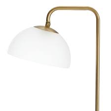 This floor lamp contrasts a dramatically curved silhouette with a glass shade for a luxe look that's bold and modern. Pin On Living