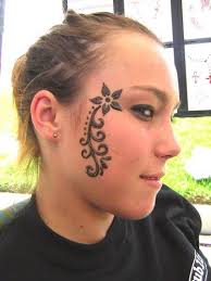 Plus the images go on brighter and sharper than conventional temporary tattoos. Henna Temporary Face Art By Temporary Tattoo Via Flickr Face Tattoos Girl Face Tattoo Face Tattoos For Women
