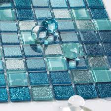 It is interlocking patterns design with teal blue crystal glass and grey nature marble. Blue Glass Tile Bathroom Floor Clear Crystal Mosaic Kitchen Wall Tiles