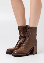 Les mules en cuir de chez bruno premi avec accessoire métallique sont l'ajout frais et chic à. Bruno Premi Bottines A Talons Hauts Malaga Cannella Cognac Zalando Fr