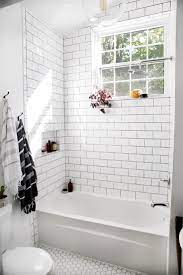 A black floor tile, white wall tile and shimmery accent tile are a winning combination. White Bathroom Tiles Ideas Diy Design Decor