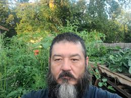 My banana plants. Northeast Oklahoma. For prospective I'm 5"8"