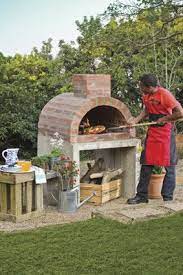 Mix mortar or cement (whatever the manufacturer recommends to adhere your material) then using a trowel, apply a good amount to the back of the brick tile and press onto the cinderblock base. Pizza Pizza Build Your Own Pizza Oven Pizza Oven Outdoor Diy Diy Pizza Oven Outdoor Pizza