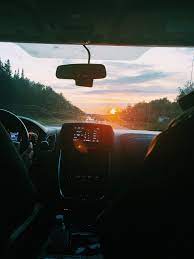 Road trip to mountain sunset sky with clouds. Road Trip Dream Dates Road Trip Trip